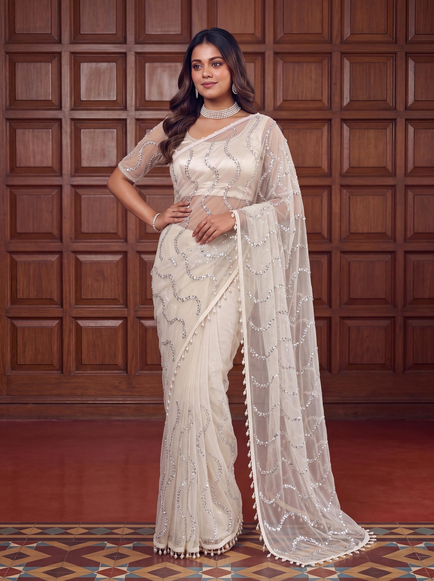 Designer handwork net saree with pearl tassles