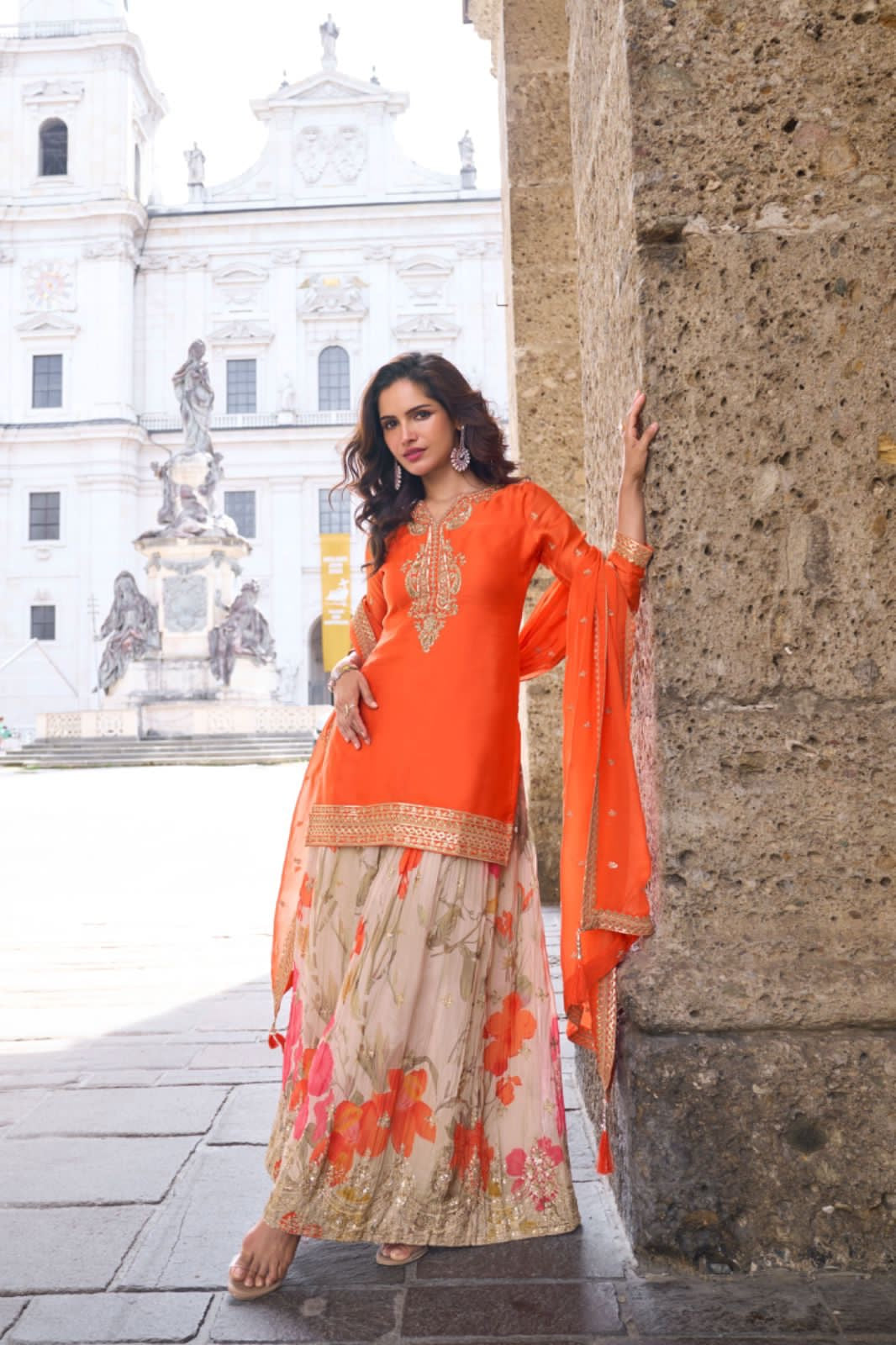 Sophisticated Kurta and dupatta paired with ornate, floral Plazo