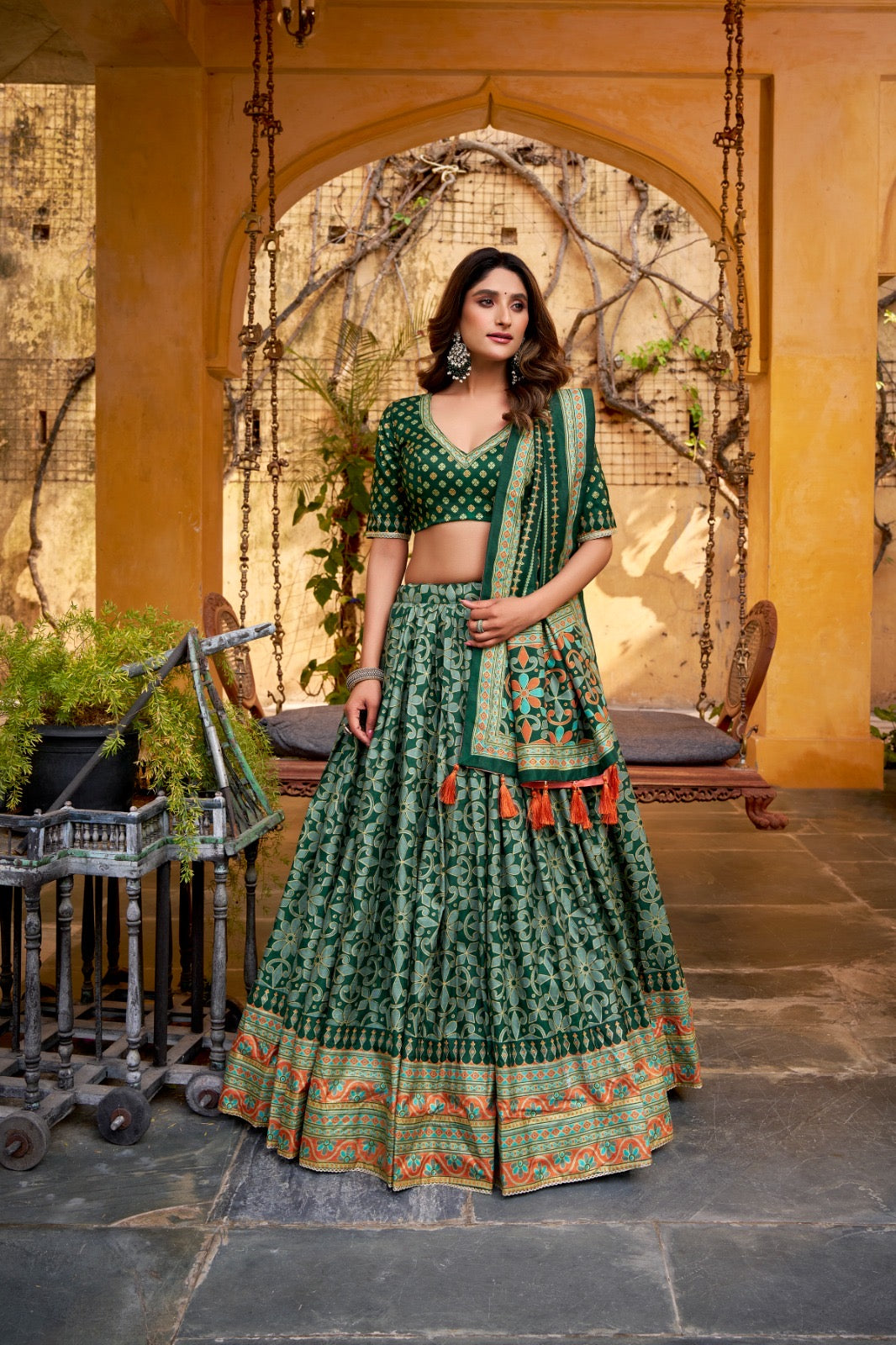 Rich textures of Tasar silk enhanced with iconic sparkle work Lehenga Choli