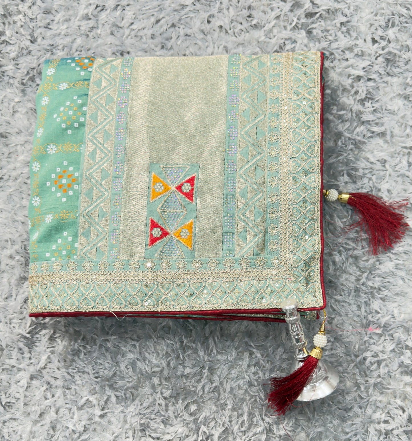 Ethnic Elegance with ornate borders and tassels Saree