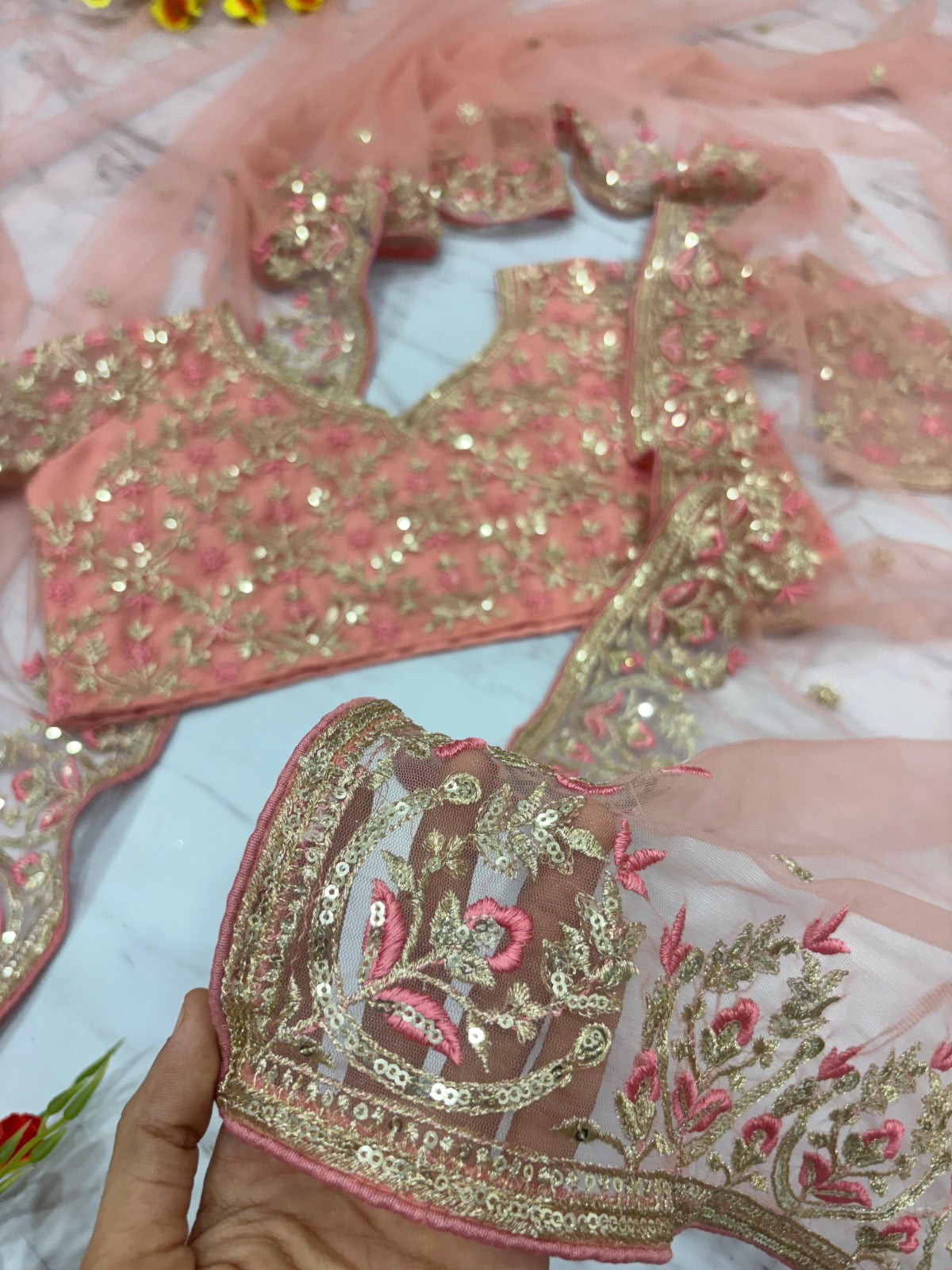 Peach Butterfly Net Saree with Intricate Zari Embroidery and Scalloped Borders