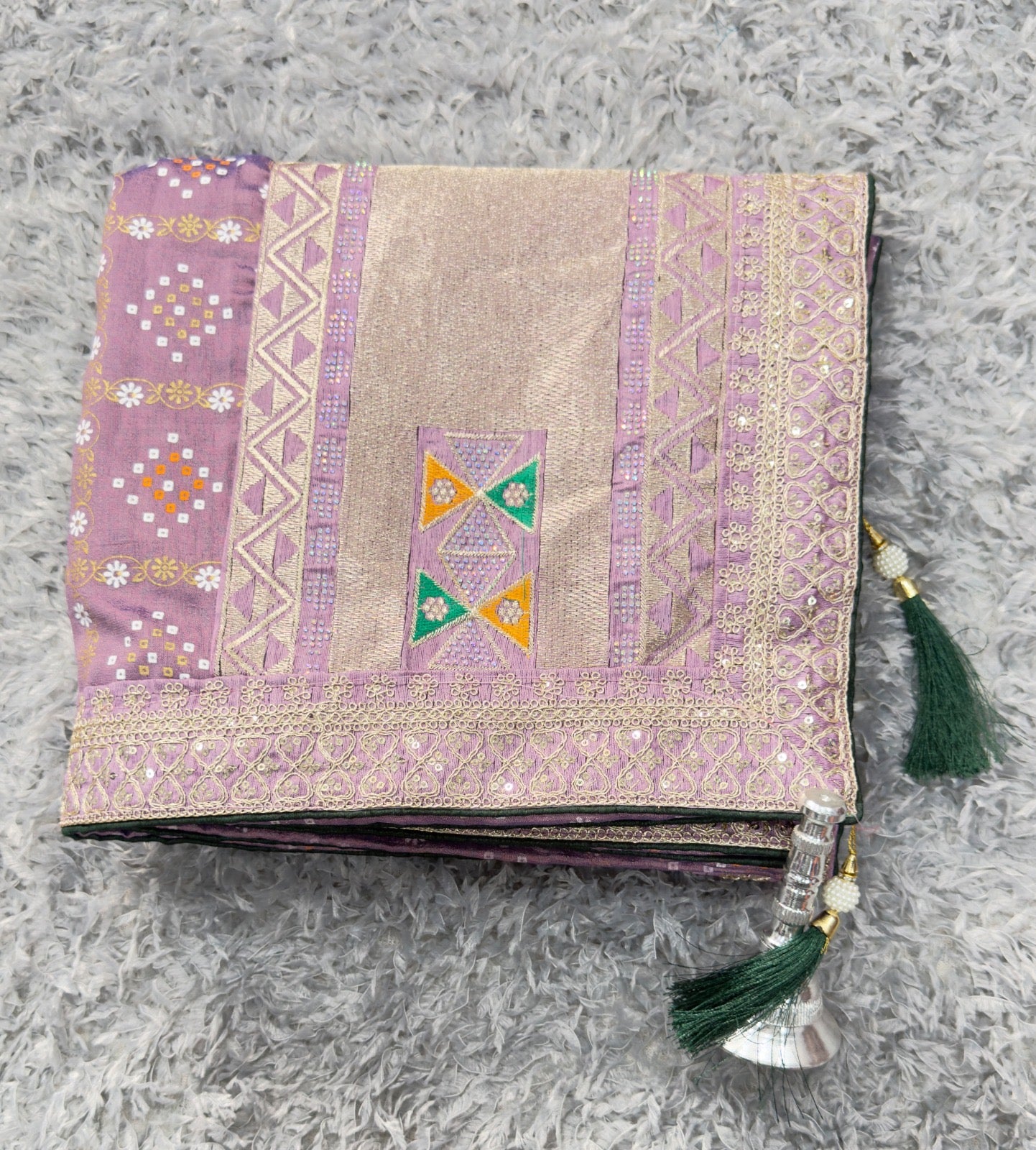 Ethnic Elegance with ornate borders and tassels Saree