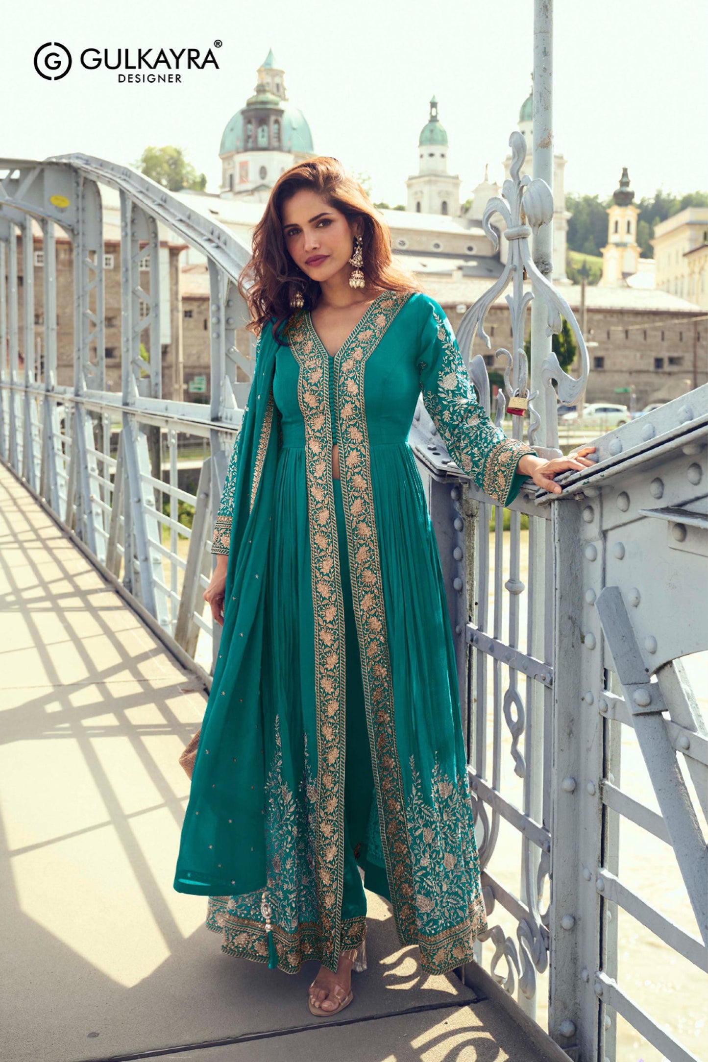 Front-open jacket-style Anarkali paired with matching trousers and a lightweight dupatta