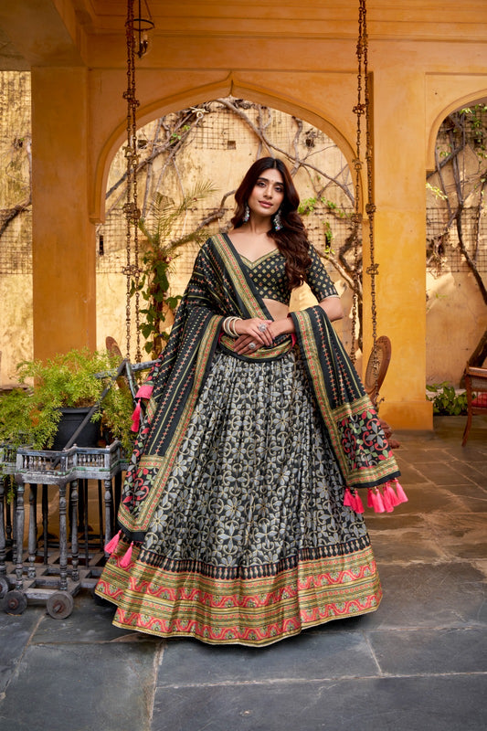 Rich textures of Tasar silk enhanced with iconic sparkle work Lehenga Choli