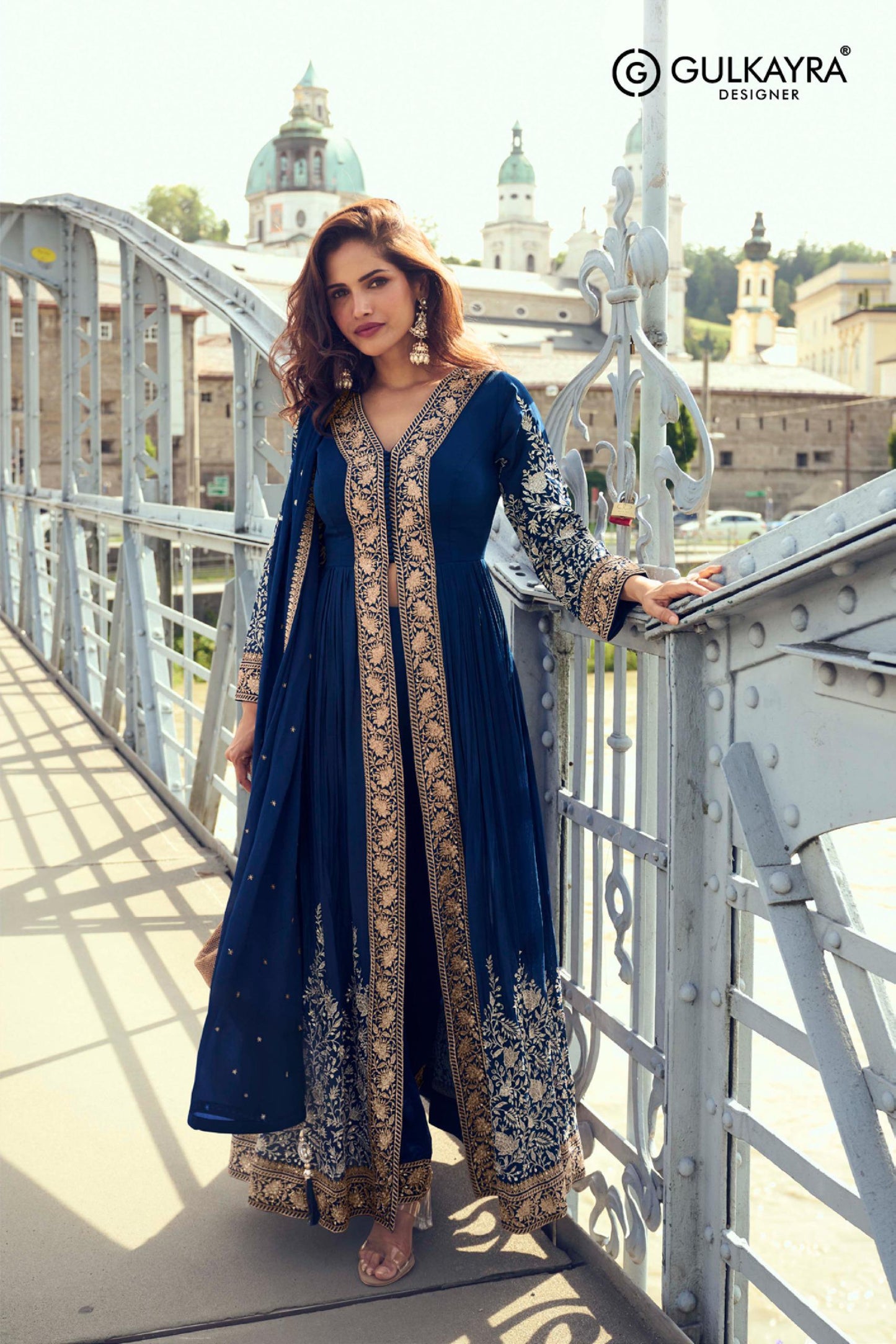 Front-open jacket-style Anarkali paired with matching trousers and a lightweight dupatta