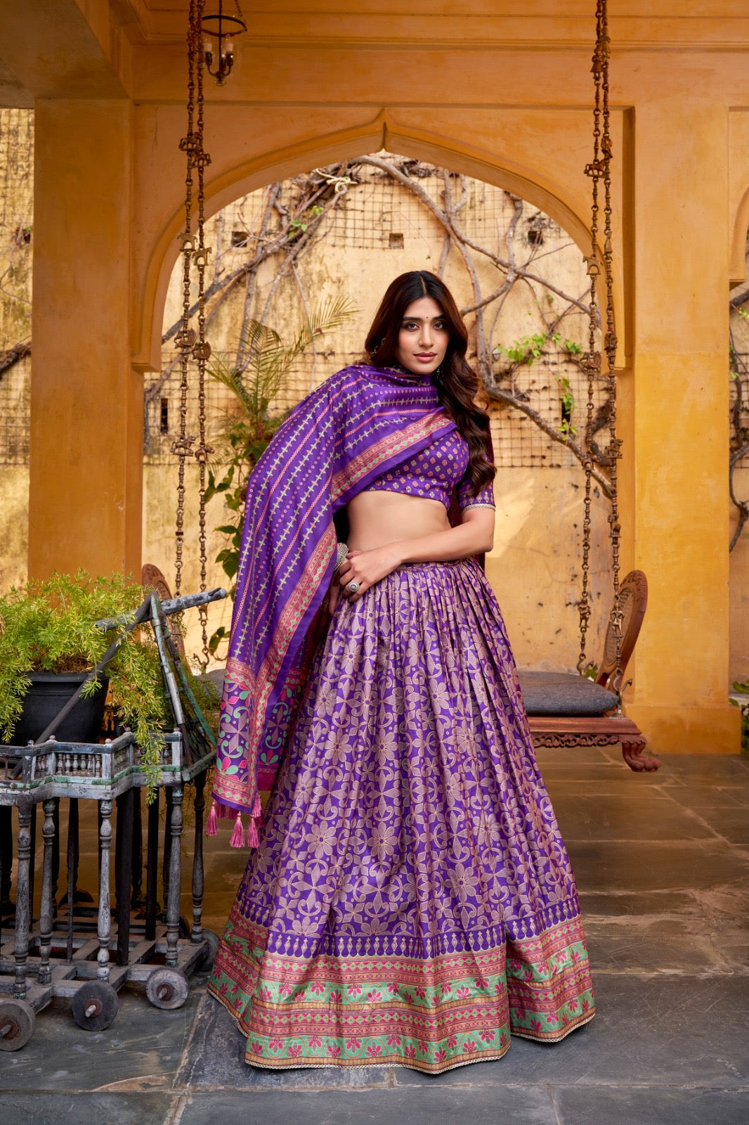 Rich textures of Tasar silk enhanced with iconic sparkle work Lehenga Choli