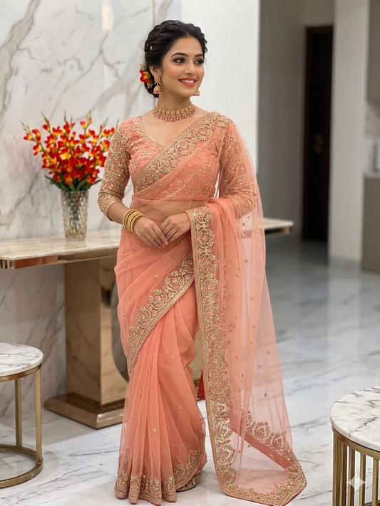 Peach Butterfly Net Saree with Intricate Zari Embroidery and Scalloped Borders