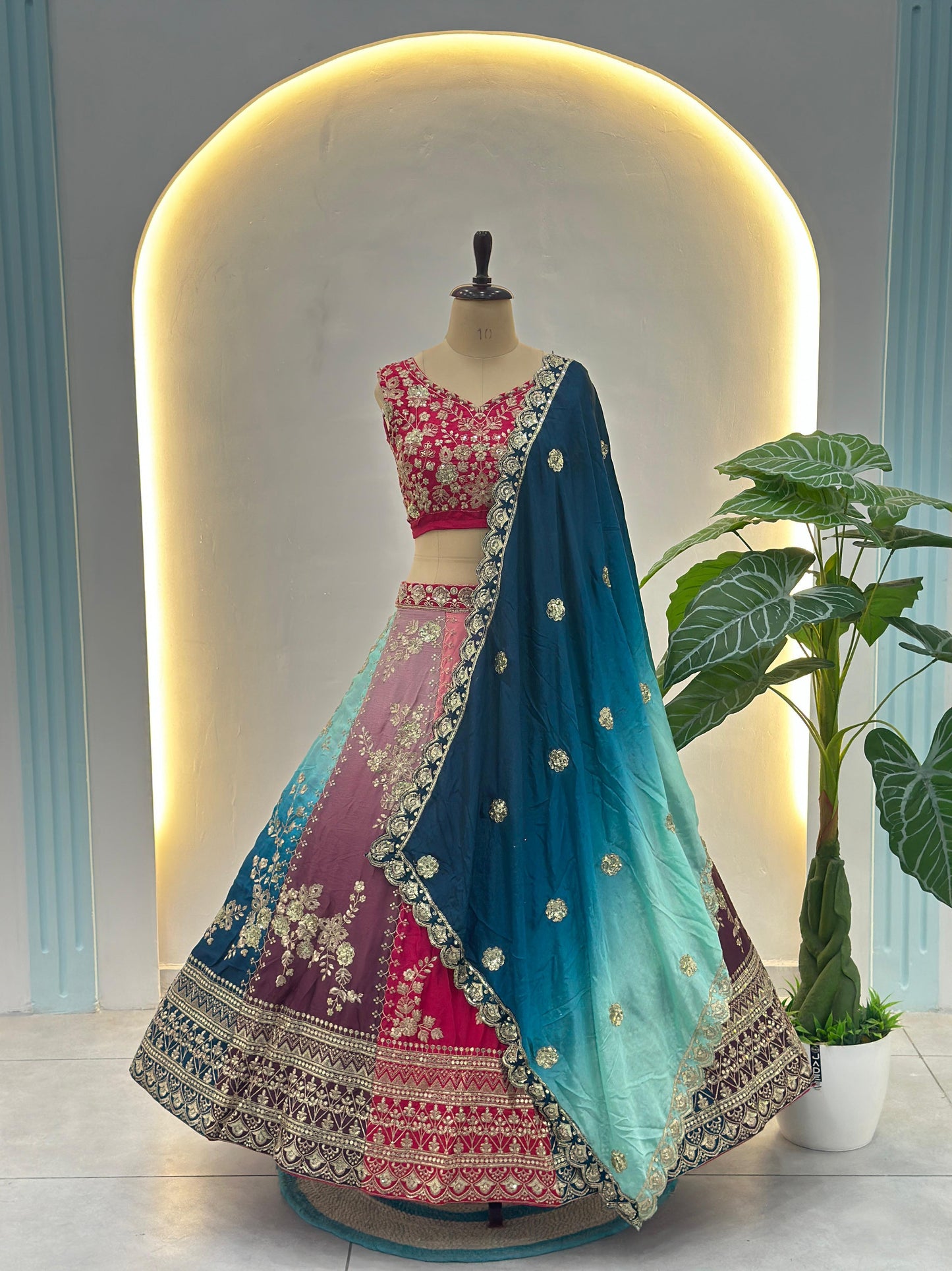 Vibrant multi colored lehenga with intricate silver embroidery