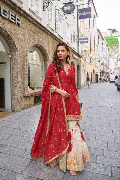 Sophisticated Kurta and dupatta paired with ornate, floral Plazo