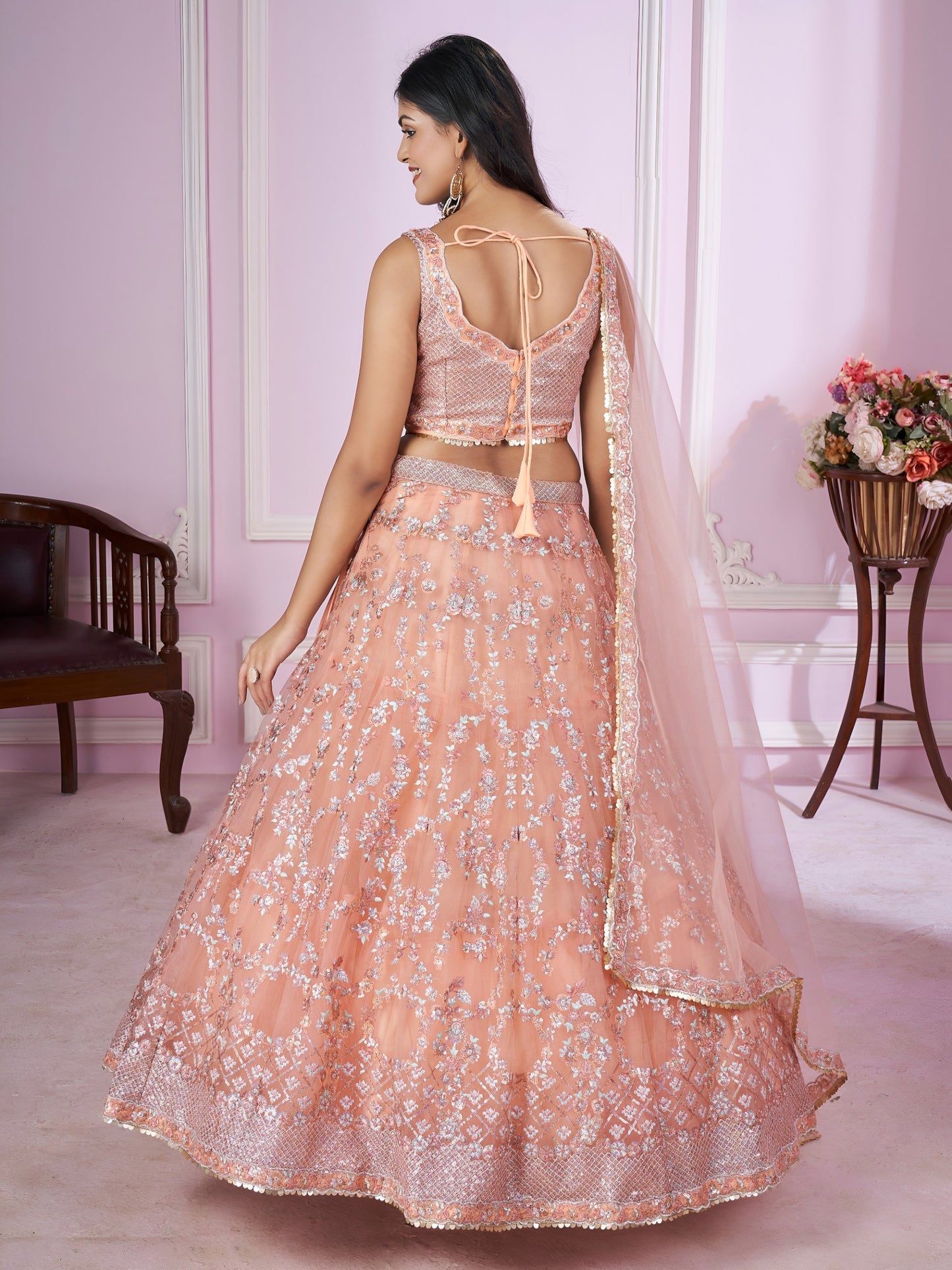 Peach Pink Embroidered Net Lehenga Choli