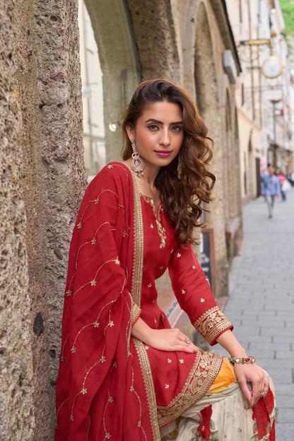 Sophisticated Kurta and dupatta paired with ornate, floral Plazo