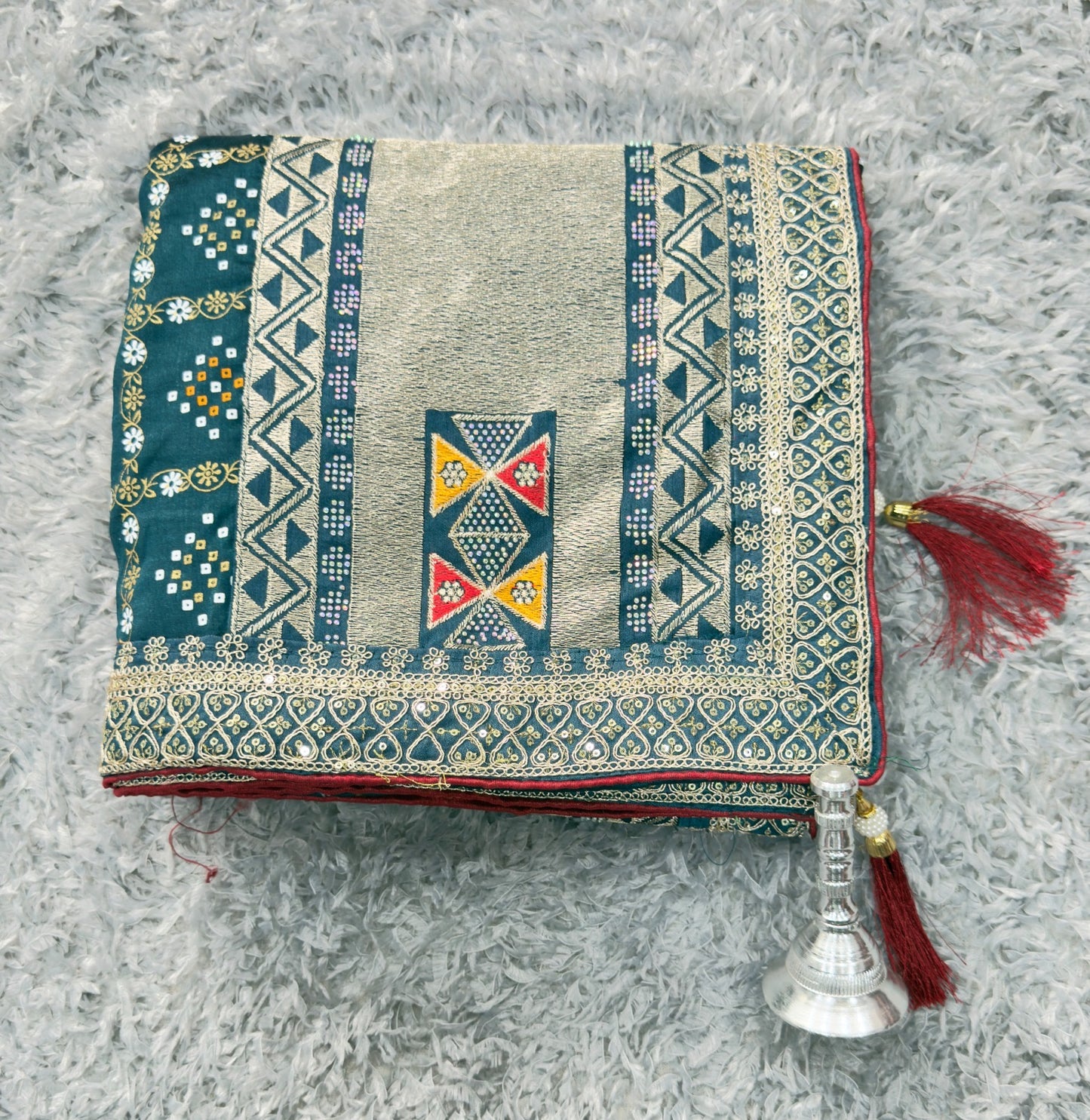 Ethnic Elegance with ornate borders and tassels Saree