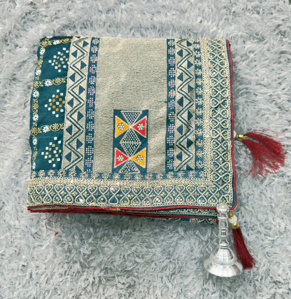 Ethnic Elegance with ornate borders and tassels Saree