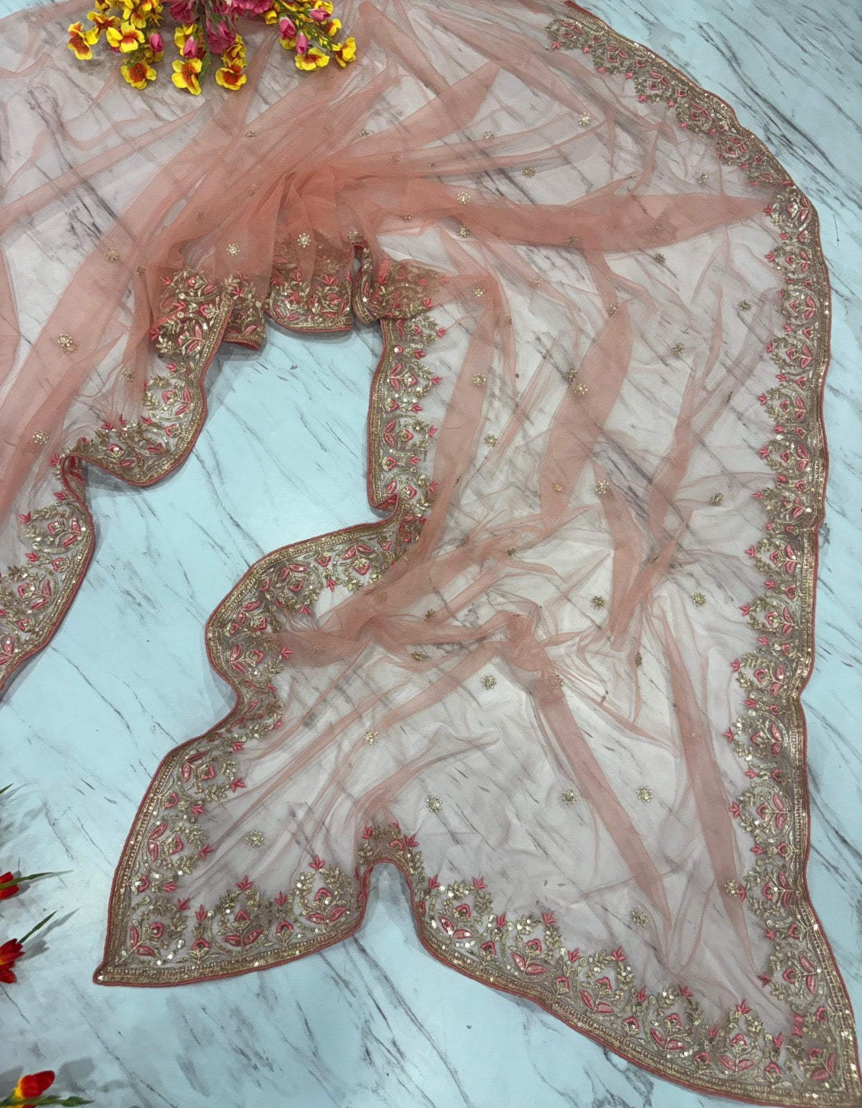 Peach Butterfly Net Saree with Intricate Zari Embroidery and Scalloped Borders
