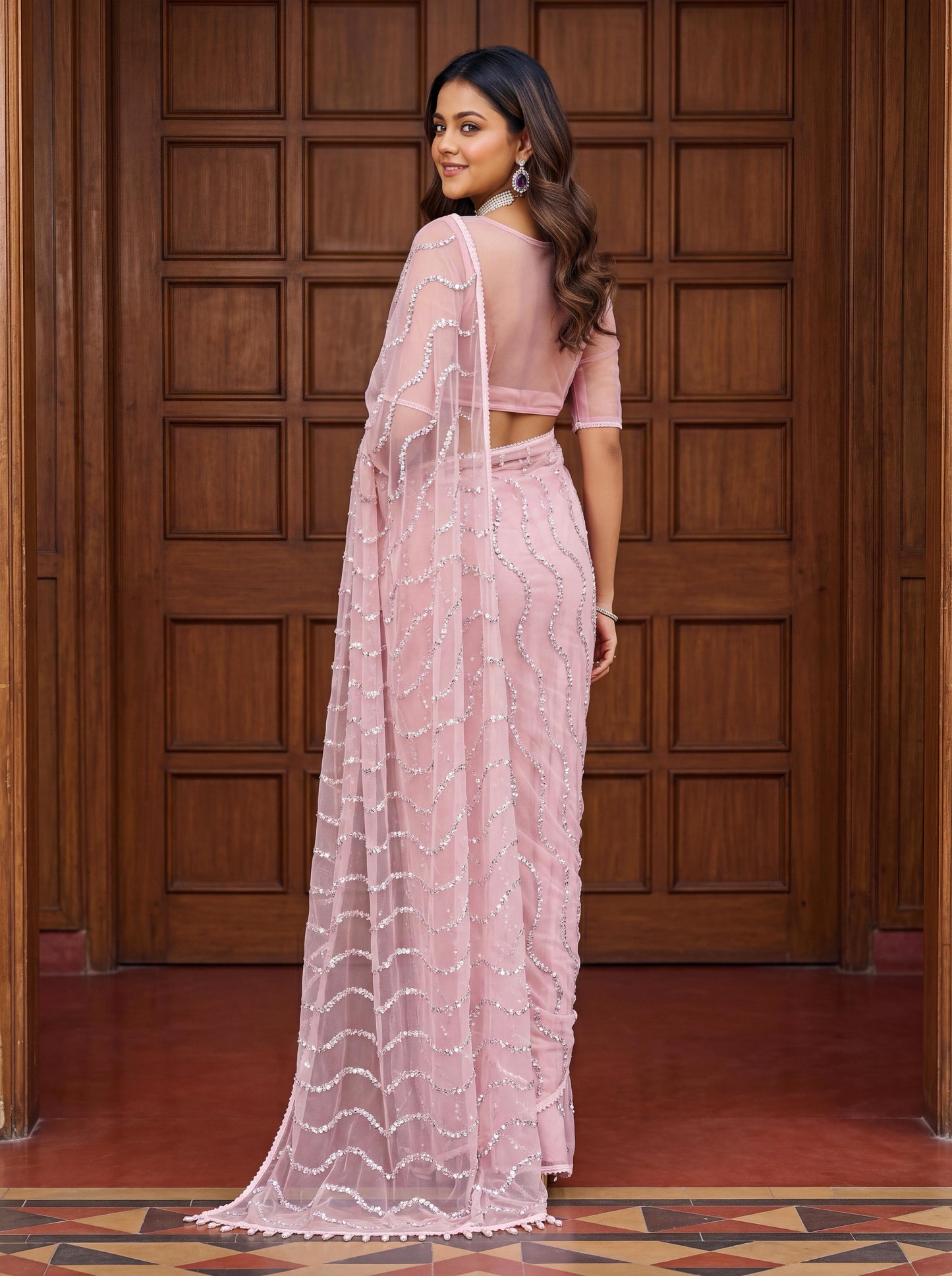 Designer handwork net saree with pearl tassles