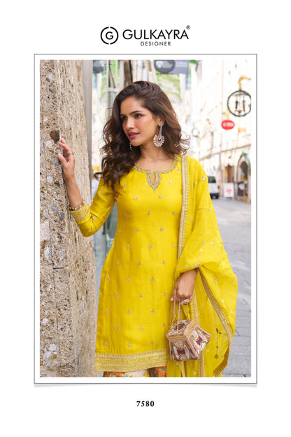 Sophisticated Kurta and dupatta paired with ornate, floral Plazo