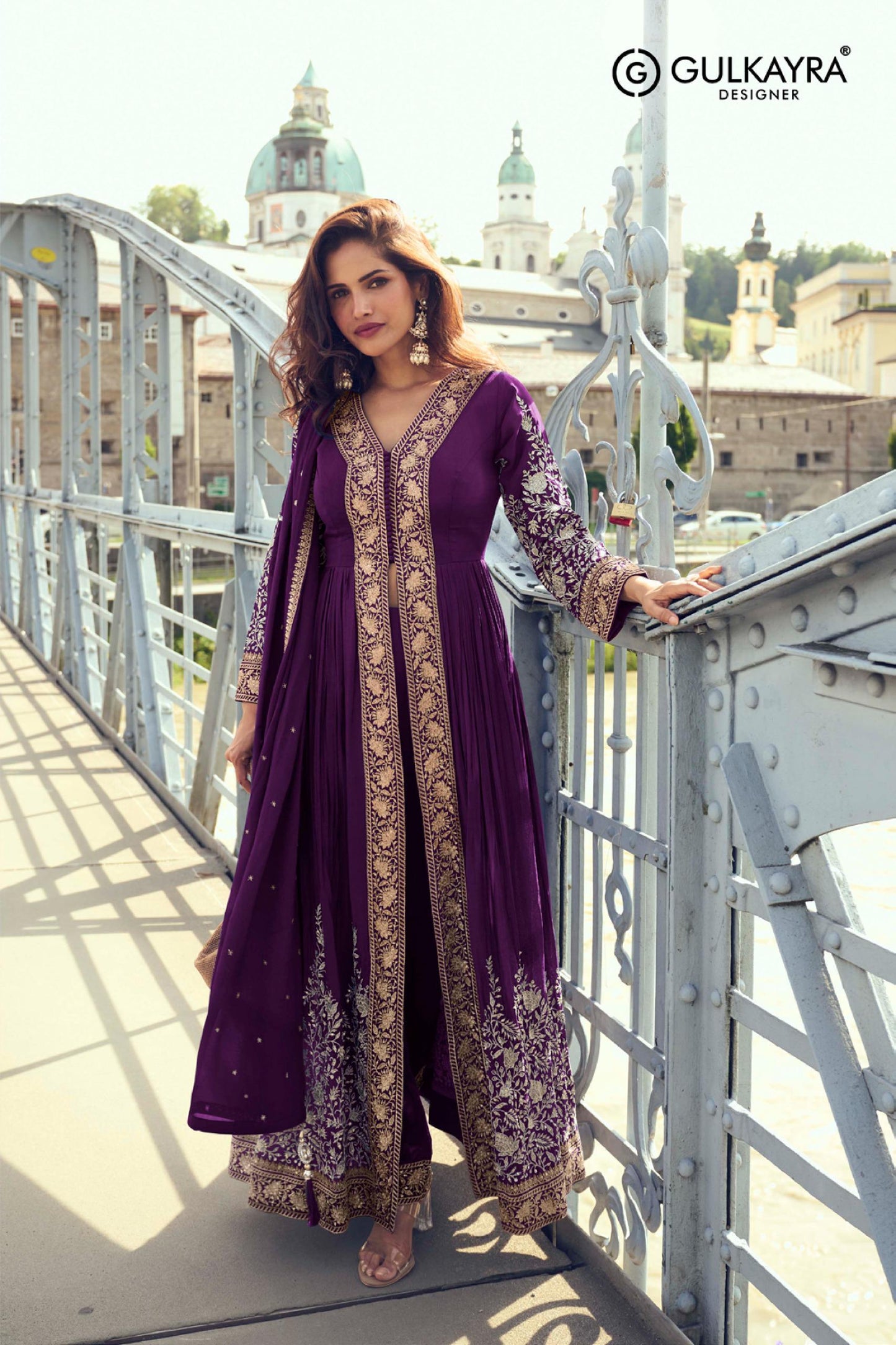 Front-open jacket-style Anarkali paired with matching trousers and a lightweight dupatta