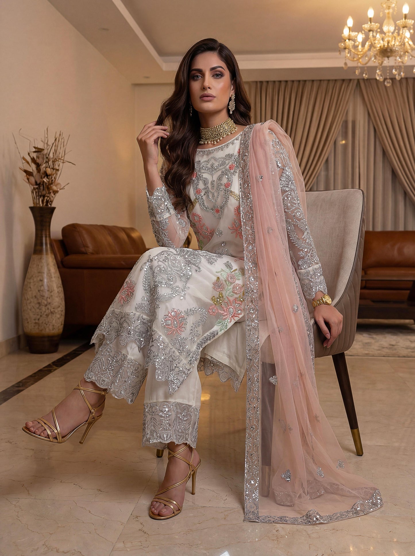 Ivory charm with delicate silver embroidery suit