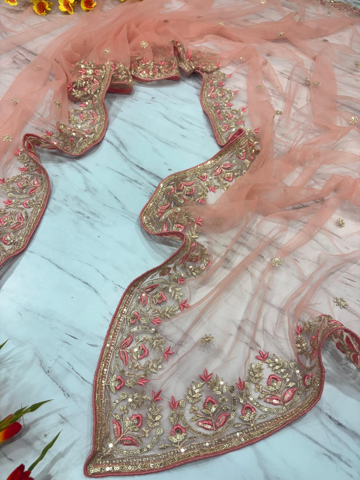 Peach Butterfly Net Saree with Intricate Zari Embroidery and Scalloped Borders