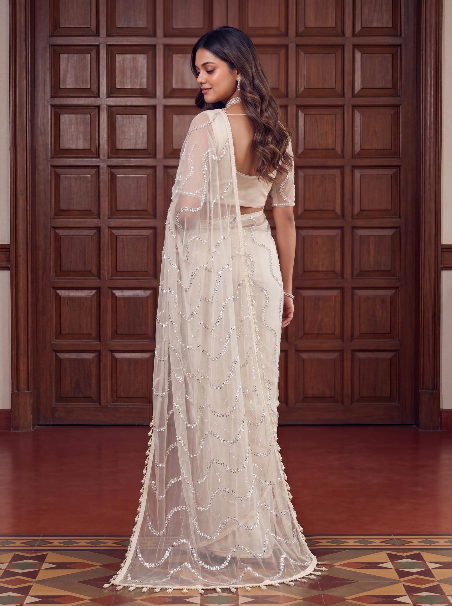 Designer handwork net saree with pearl tassles