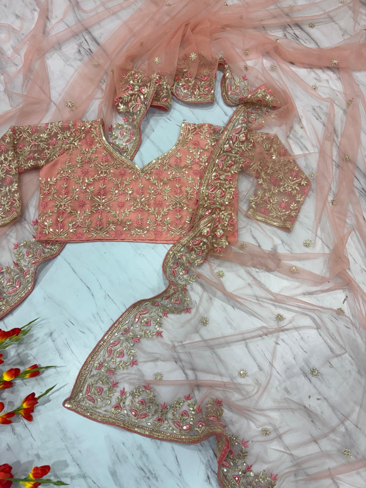 Peach Butterfly Net Saree with Intricate Zari Embroidery and Scalloped Borders