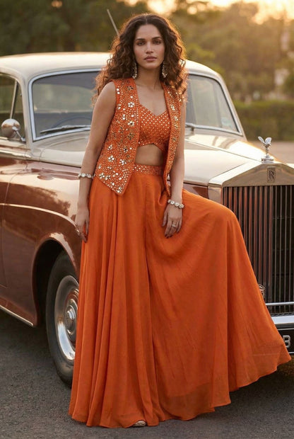 Sunset-orange mirrored koti and flared lehenga set