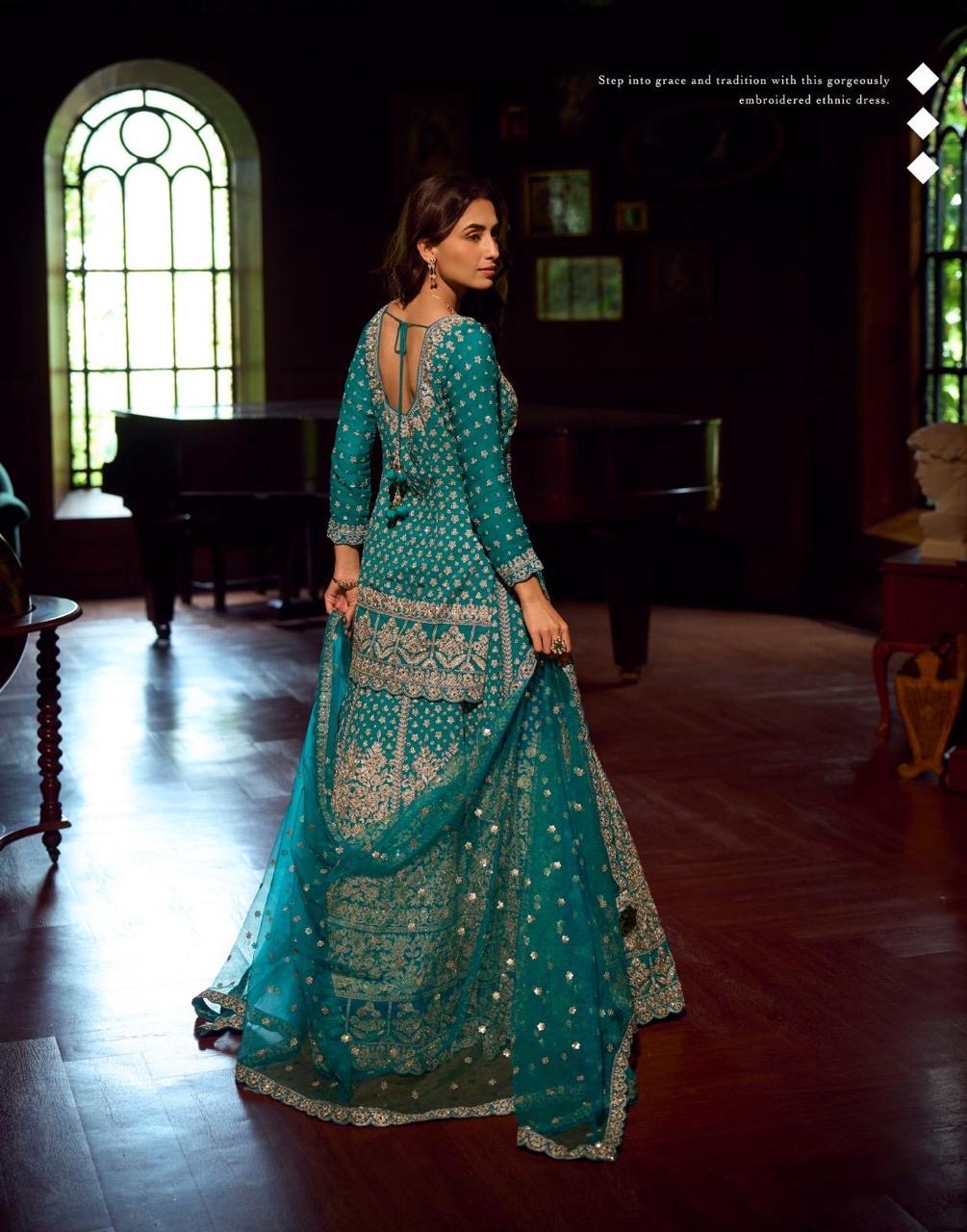 HEAVY FESTIVE LOOK FRONT AND BACK FULLY EMBROIDERED MIRROR WORK TOP WITH HEAVY EMBROIDERED SKIRT