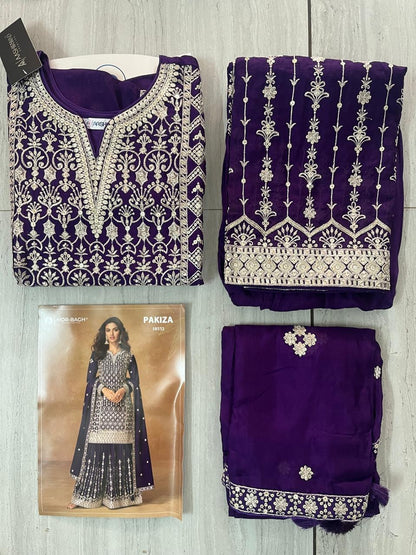 Sophisticated long-sleeved kurta paired with pleated sharara pants