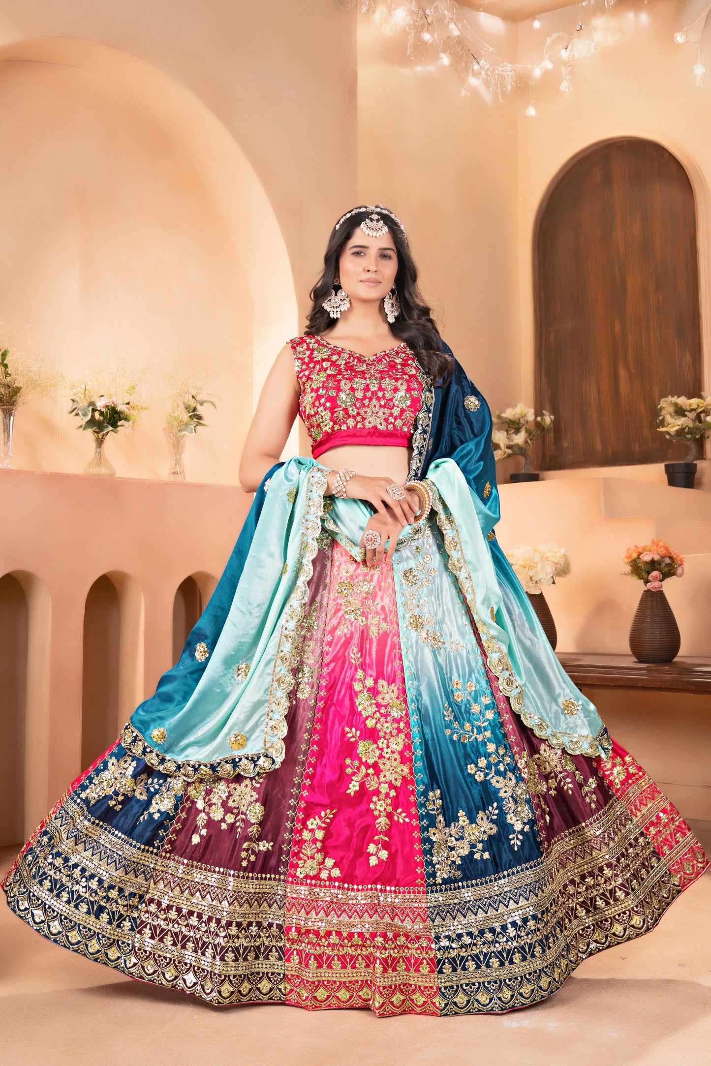 Vibrant multi colored lehenga with intricate silver embroidery