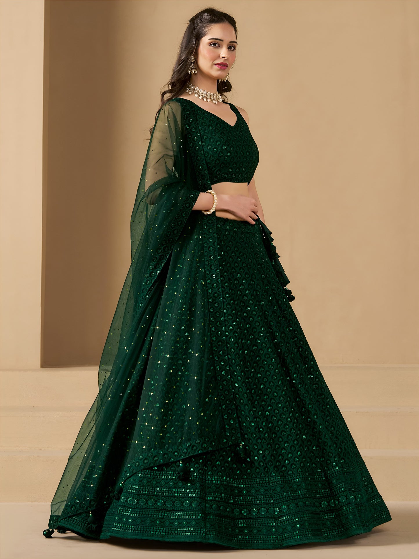 Turn heads in this captivating green georgette lehenga choli