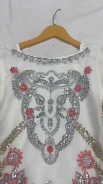 Ivory charm with delicate silver embroidery suit