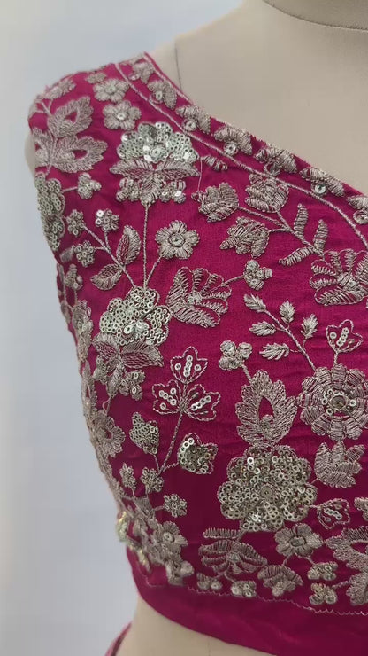 Vibrant multi colored lehenga with intricate silver embroidery